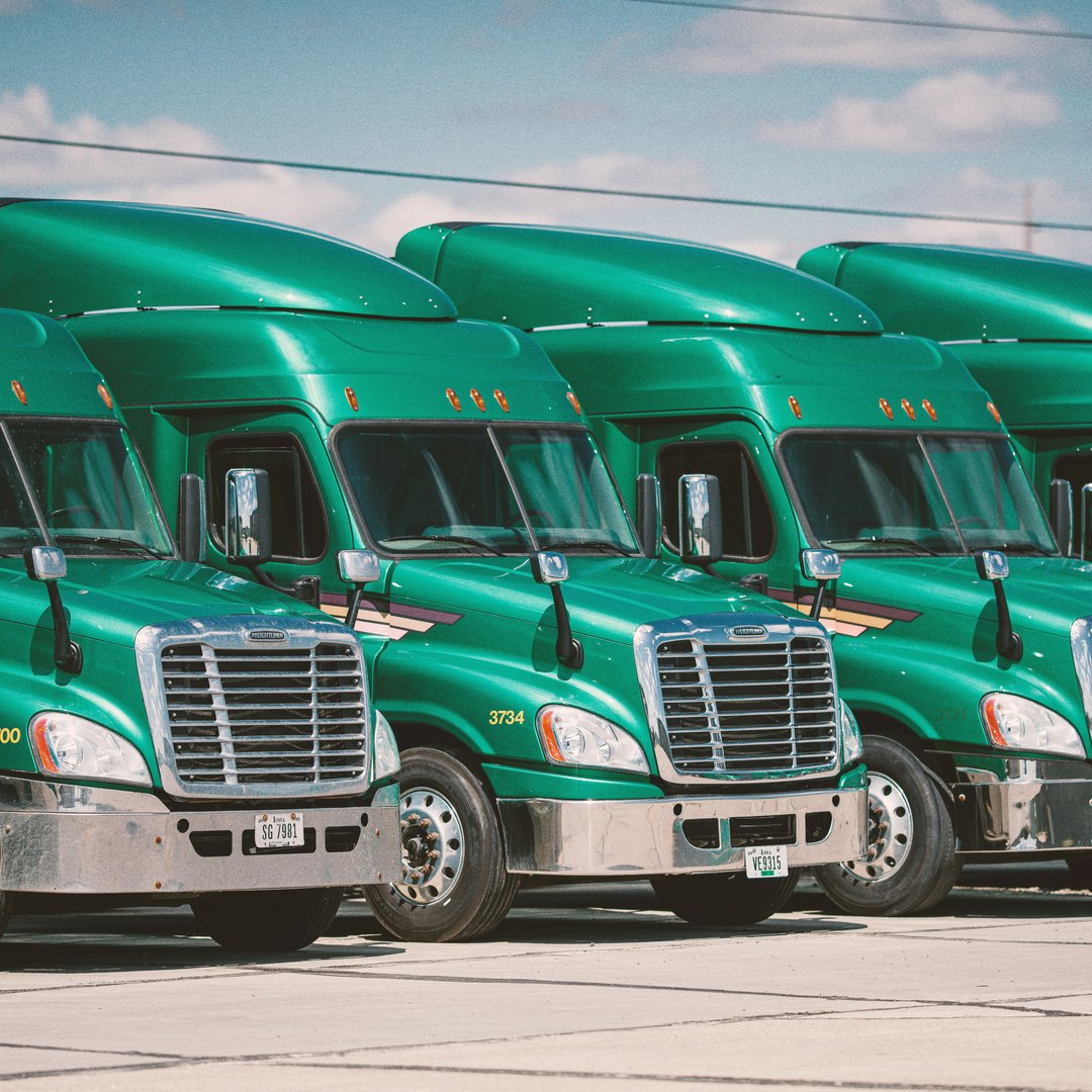 Fleet of green trucks