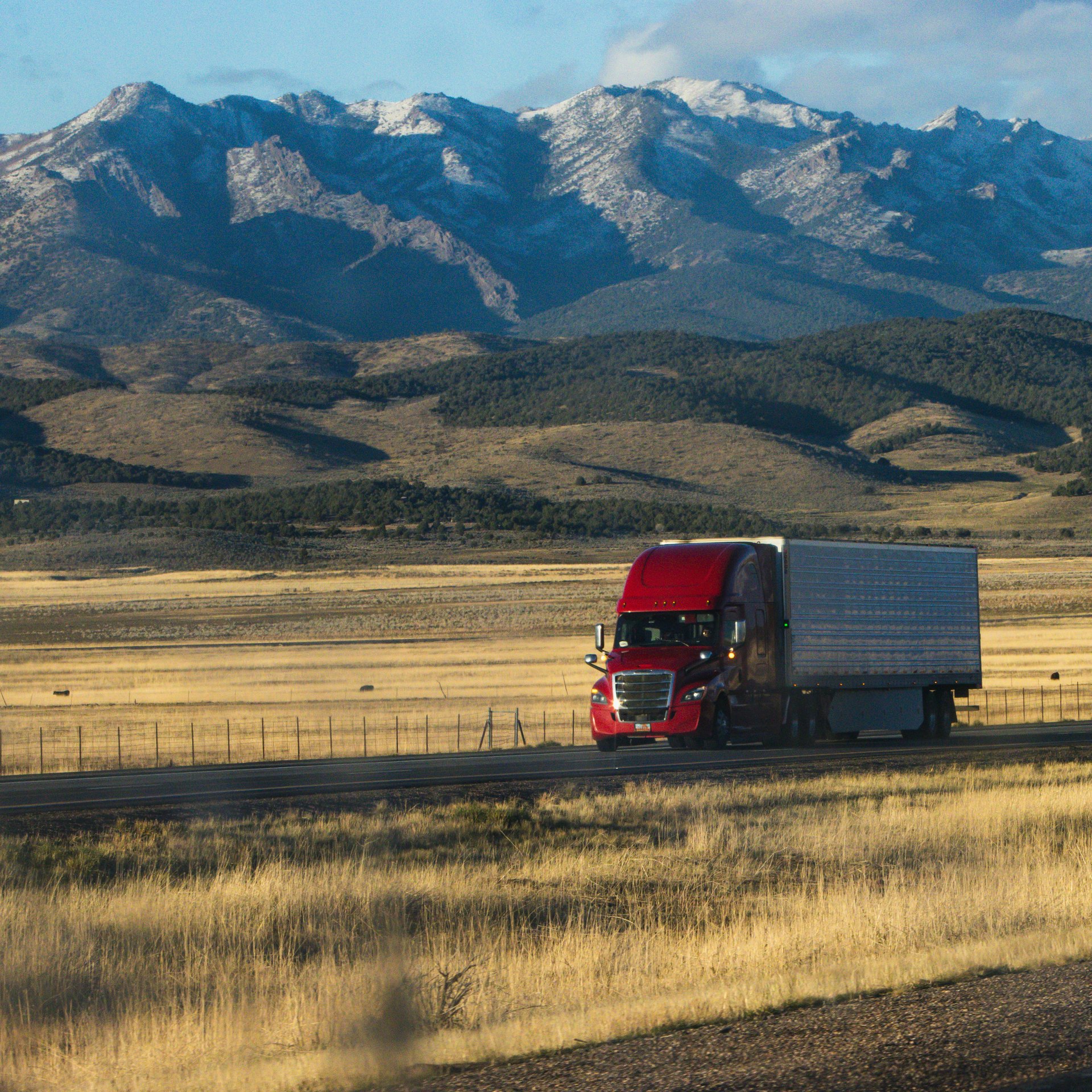 Red truck on a mountain road
